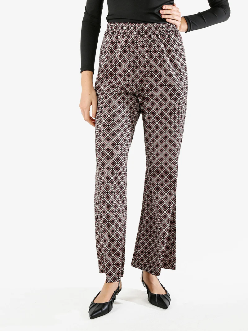 Pantaloni donna a zampa con stampa geometrica - multicolore