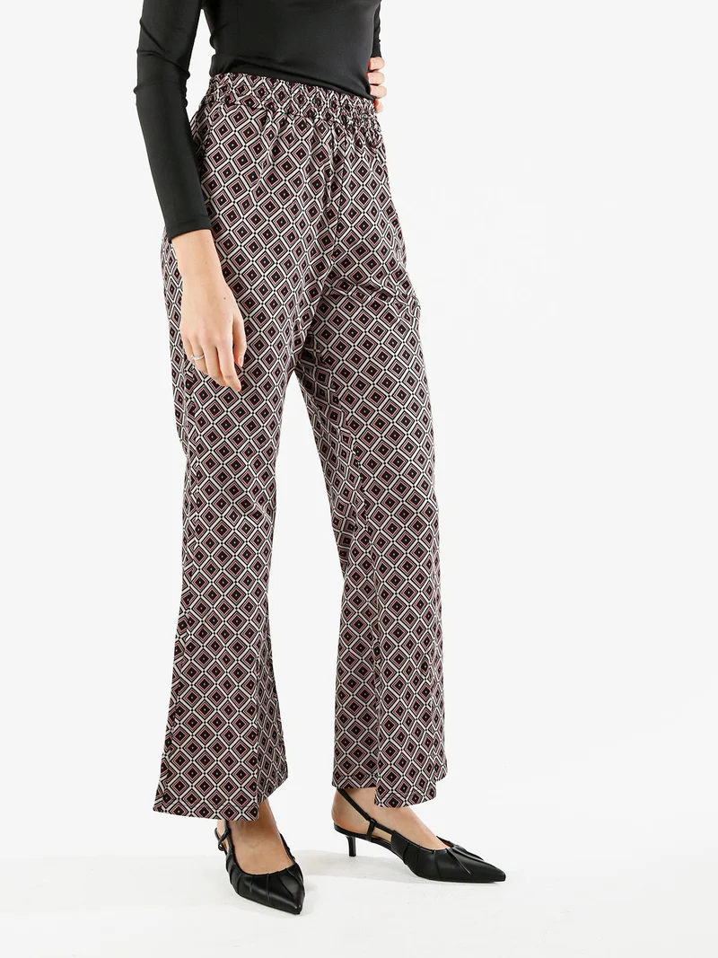 Pantaloni donna a zampa con stampa geometrica - multicolore