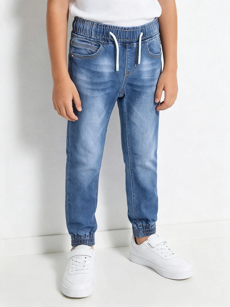Jeans da bambino con coulisse e polsini - jeans