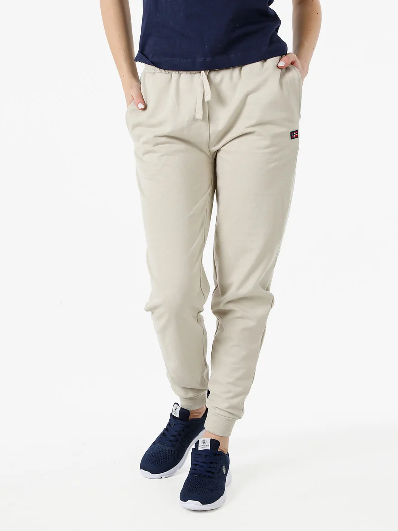 Pantaloni tuta da donna in cotone con coulisse e polsini - beige