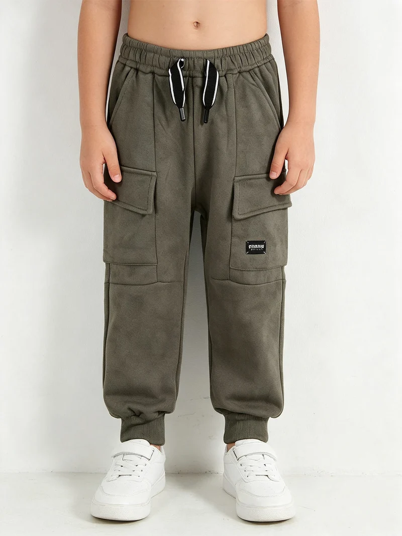 Pantaloni da ragazzo con tasconi e polsini - militare