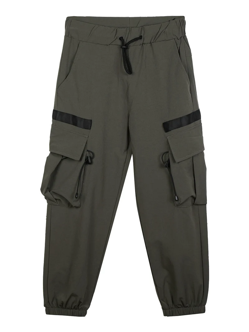 Pantaloni impermeabili da ragazzo con tasconi e polsini - militare