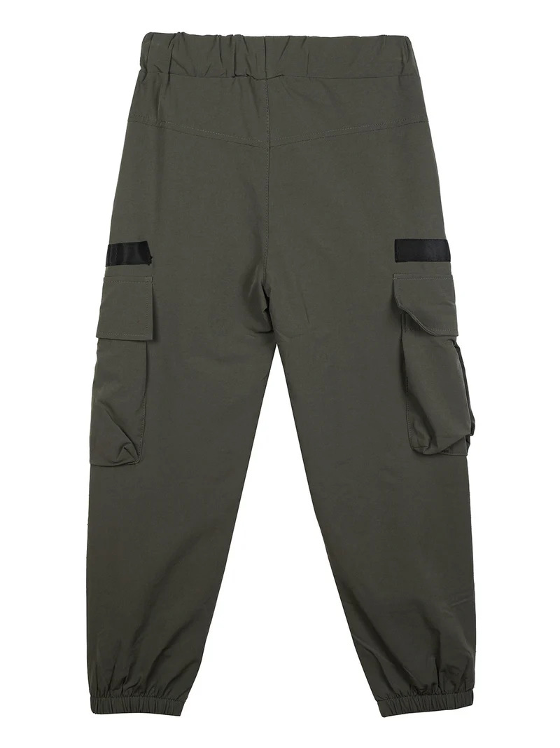 Pantaloni impermeabili da ragazzo con tasconi e polsini - militare