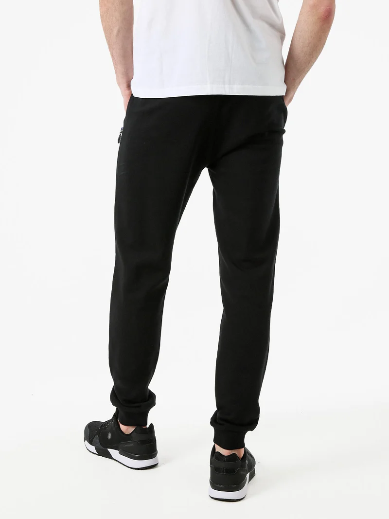 Pantaloni tuta da uomo con coulisse e polsini - nero