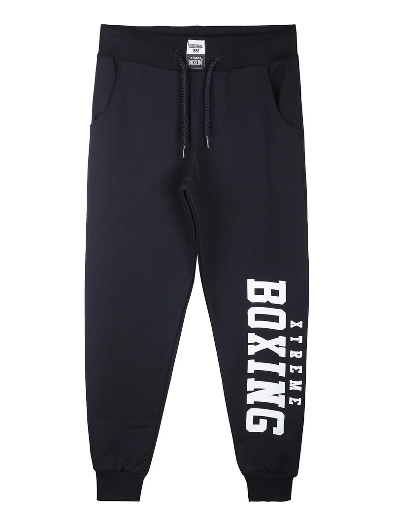 Pantaloni sportivi da ragazzo con coulisse e polsini - blu scuro