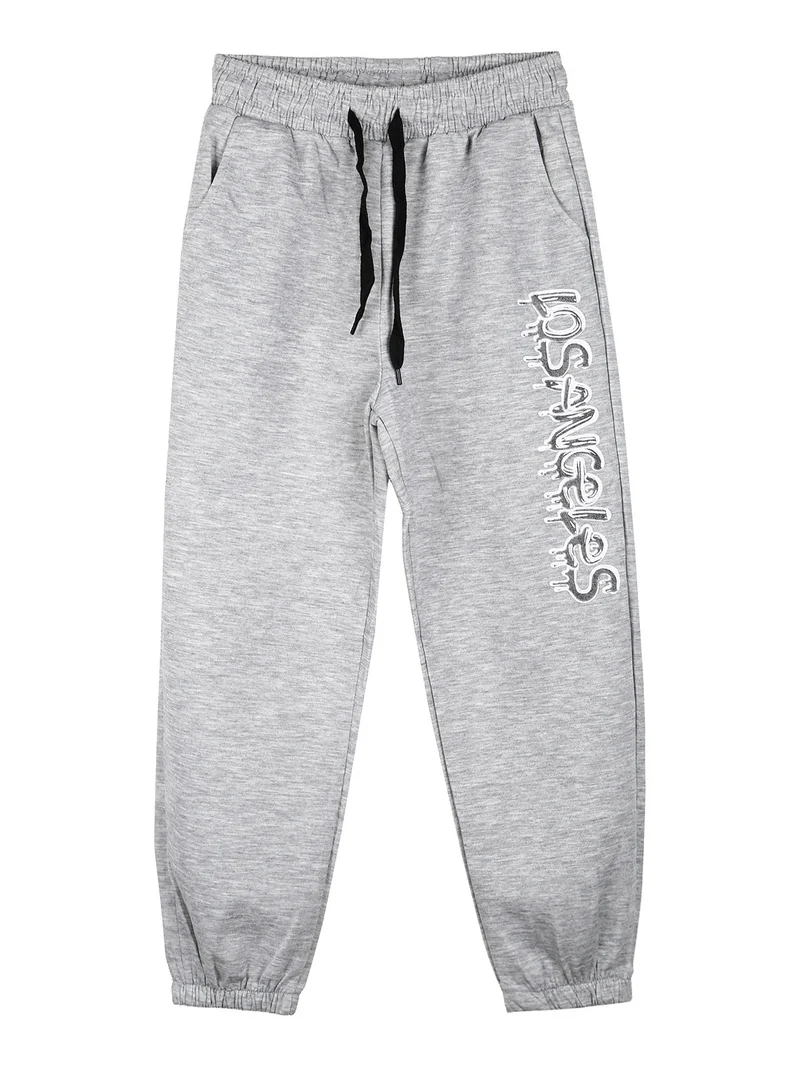 Pantaloni tuta da bambino con coulisse ed elastico sul finale - grigio