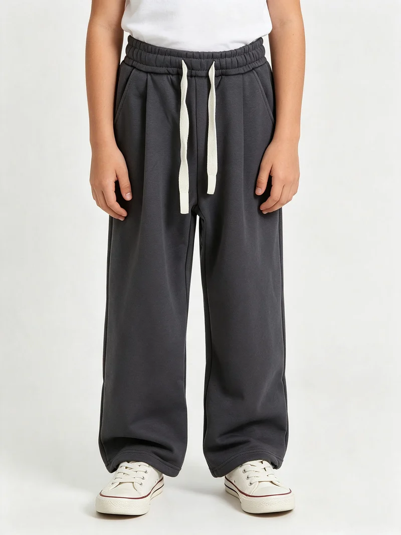 Pantaloni tuta da ragazzo in felpa con coulisse e interno felpato - grigio