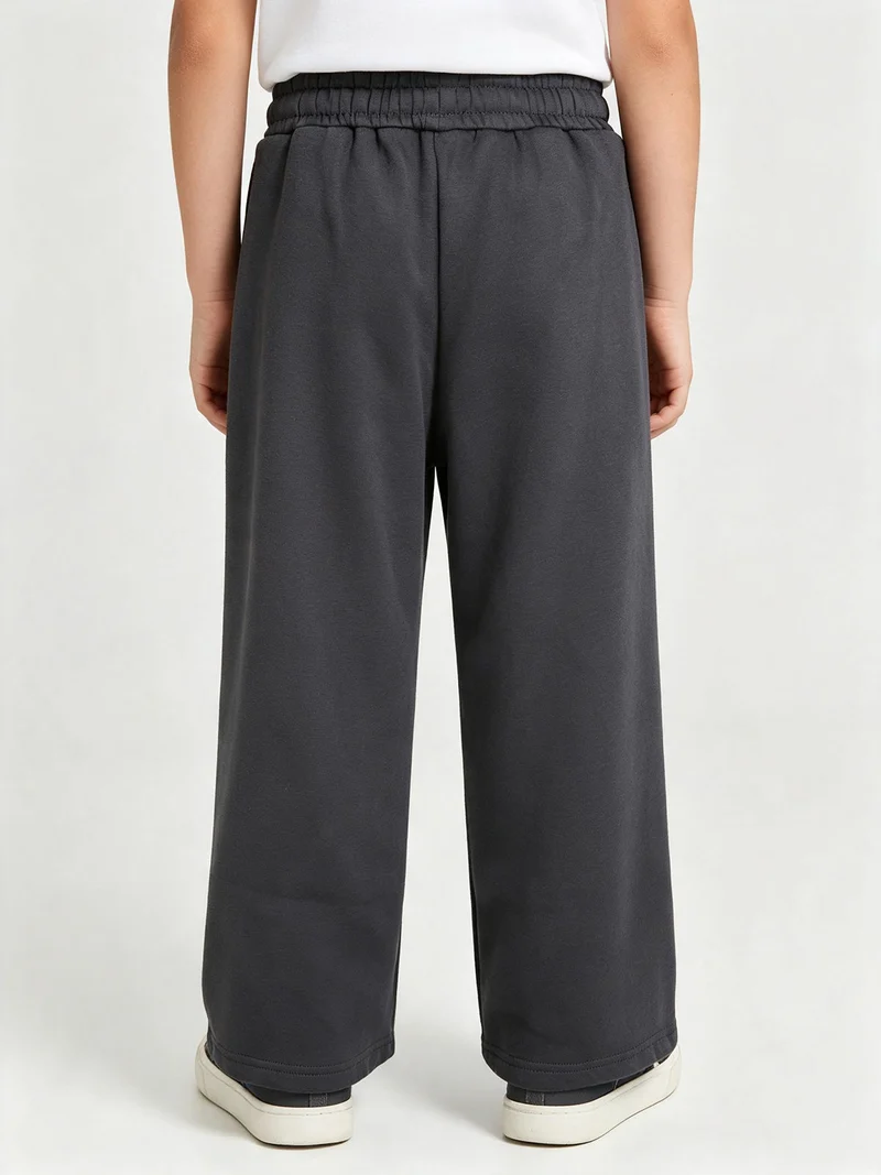 Pantaloni tuta da ragazzo in felpa con coulisse e interno felpato - grigio