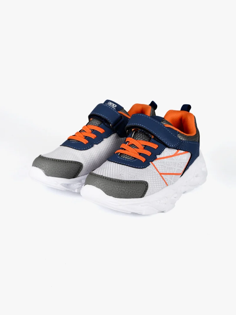 Sneakers da bambino con strappo - grigio