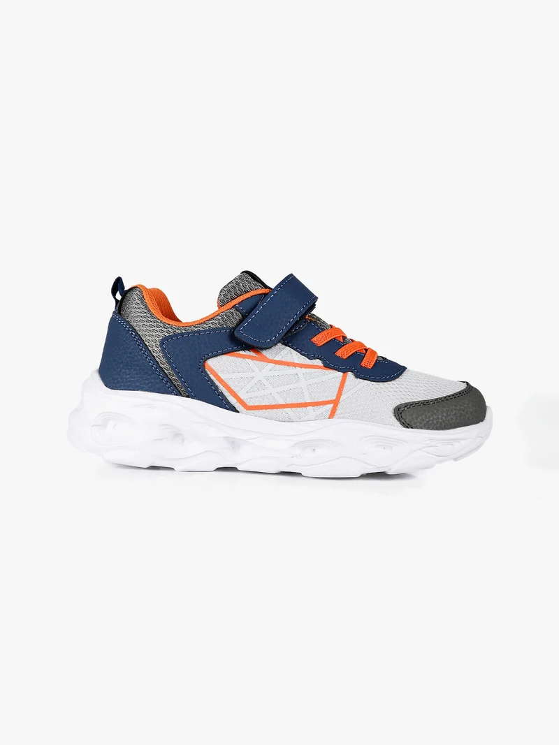 Sneakers da bambino con strappo - grigio