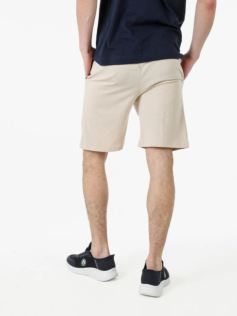 Bermuda sportivi da uomo in misto cotone con coulisse e logo - beige