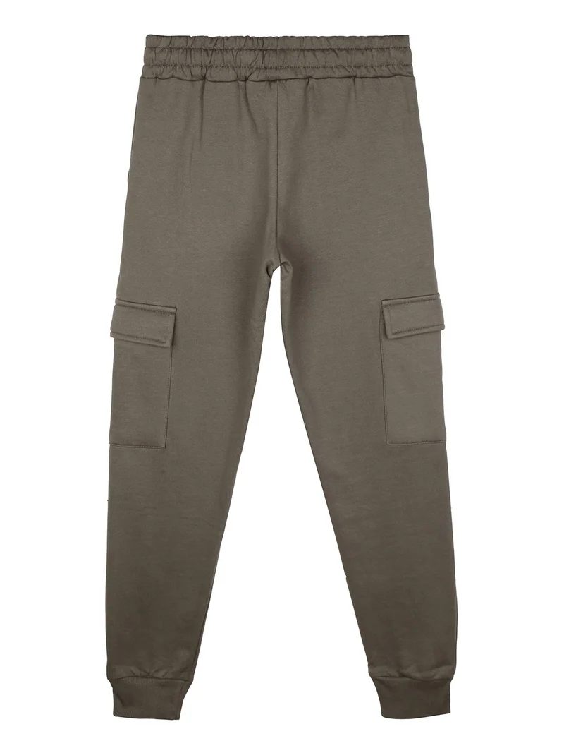 Pantaloni tuta da bambino con tasconi laterali e polsini - militare