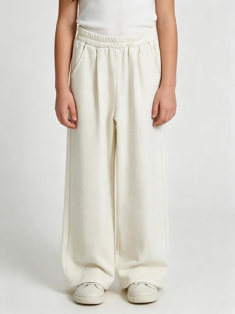 Pantaloni da bambina in maglia con elastico in vita - panna