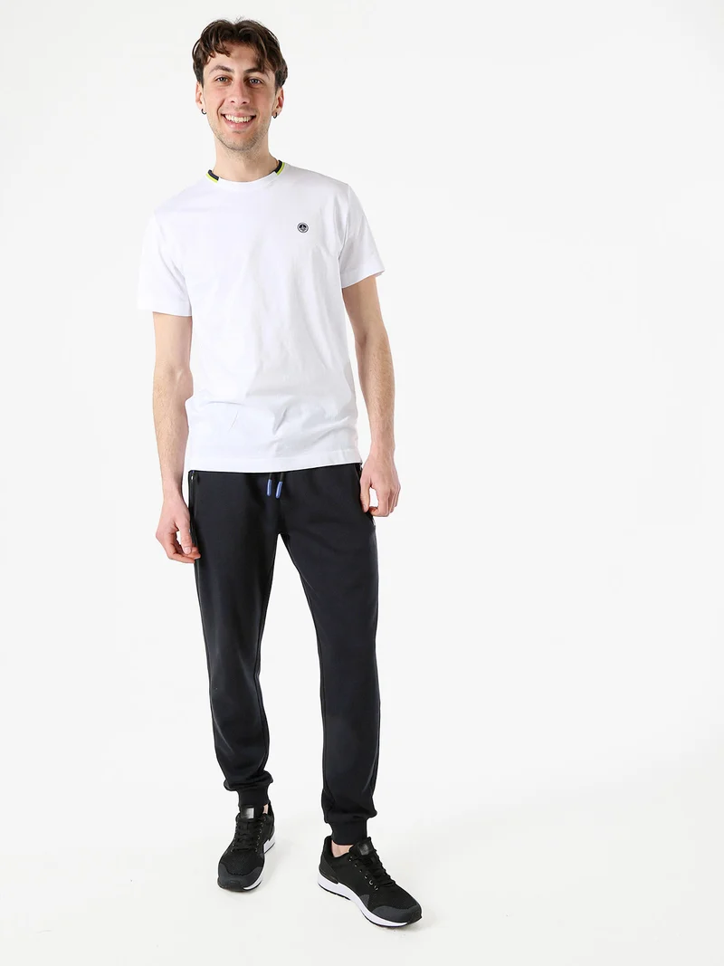 Pantaloni tuta da uomo con coulisse e polsini - blu scuro