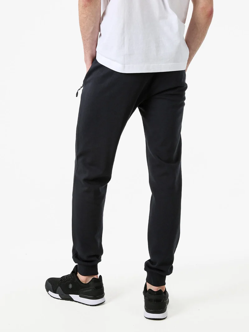 Pantaloni tuta da uomo con coulisse e polsini - blu scuro