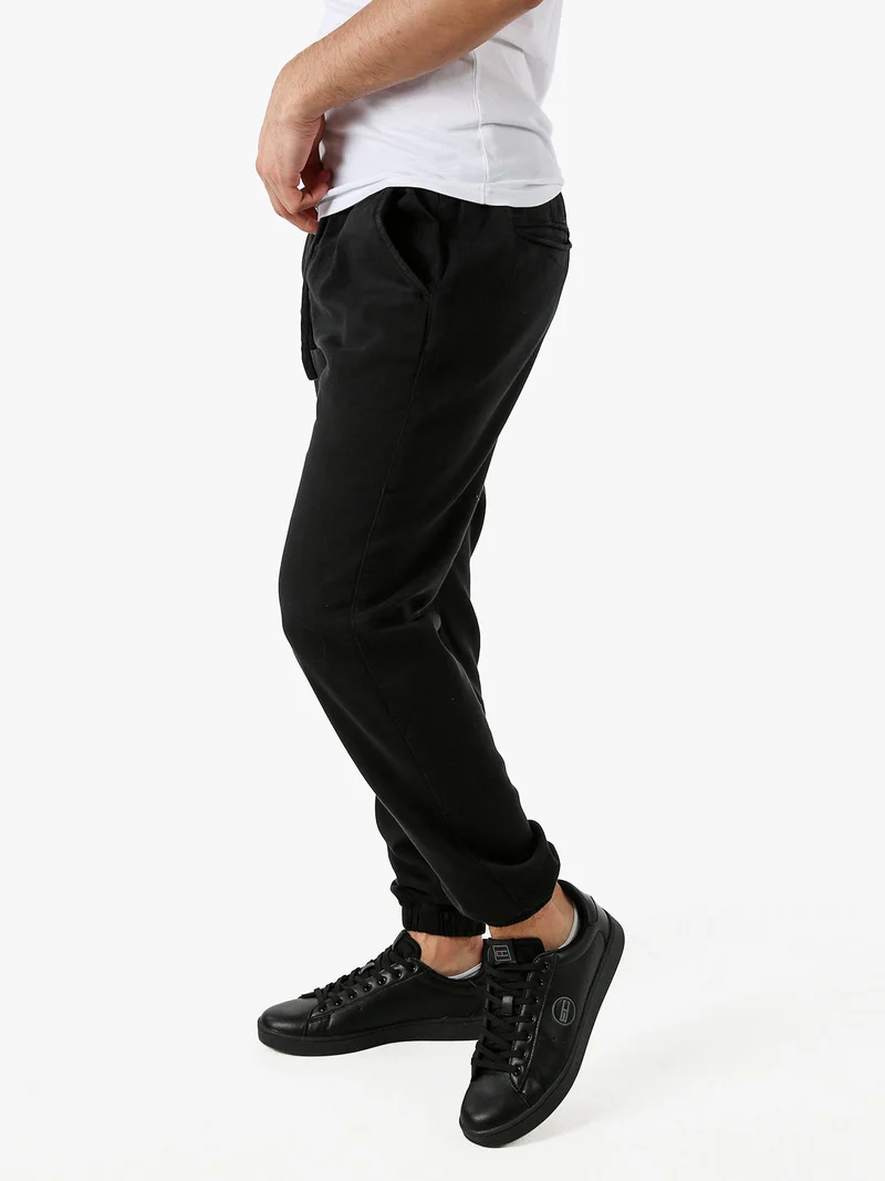 Pantaloni da uomo in cotone con coulisse ed elastico sul finale - nero