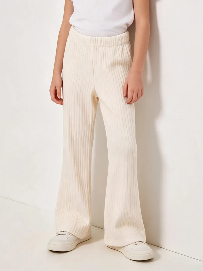 Pantaloni da bambina in velluto a zampa - panna