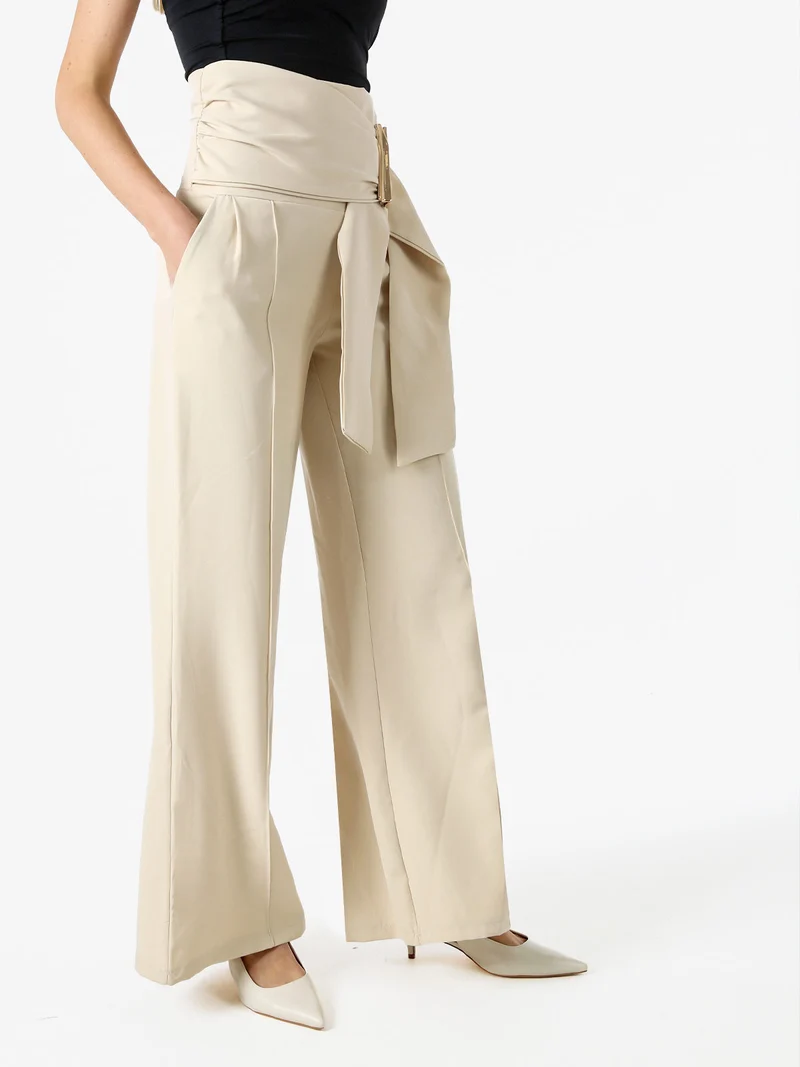 Pantaloni eleganti da donna a vita alta con dettaglio - beige