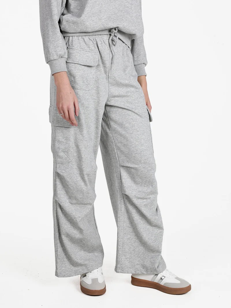 Pantaloni donna in felpa con tasconi - grigio
