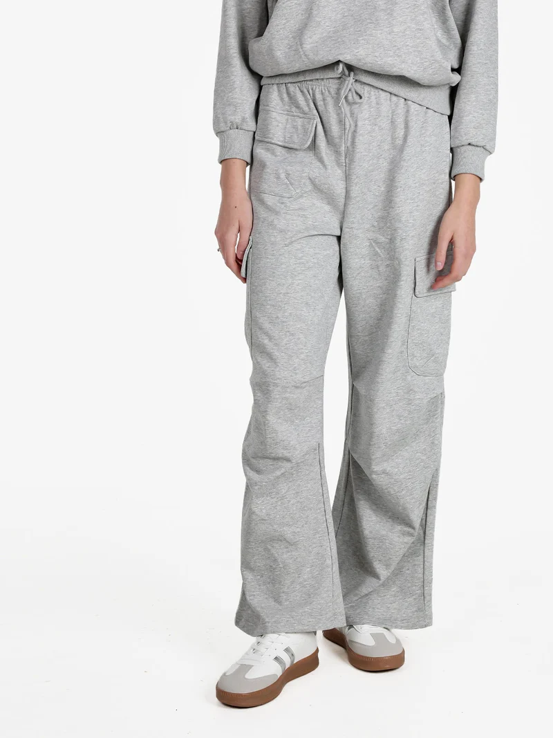 Pantaloni donna in felpa con tasconi - grigio