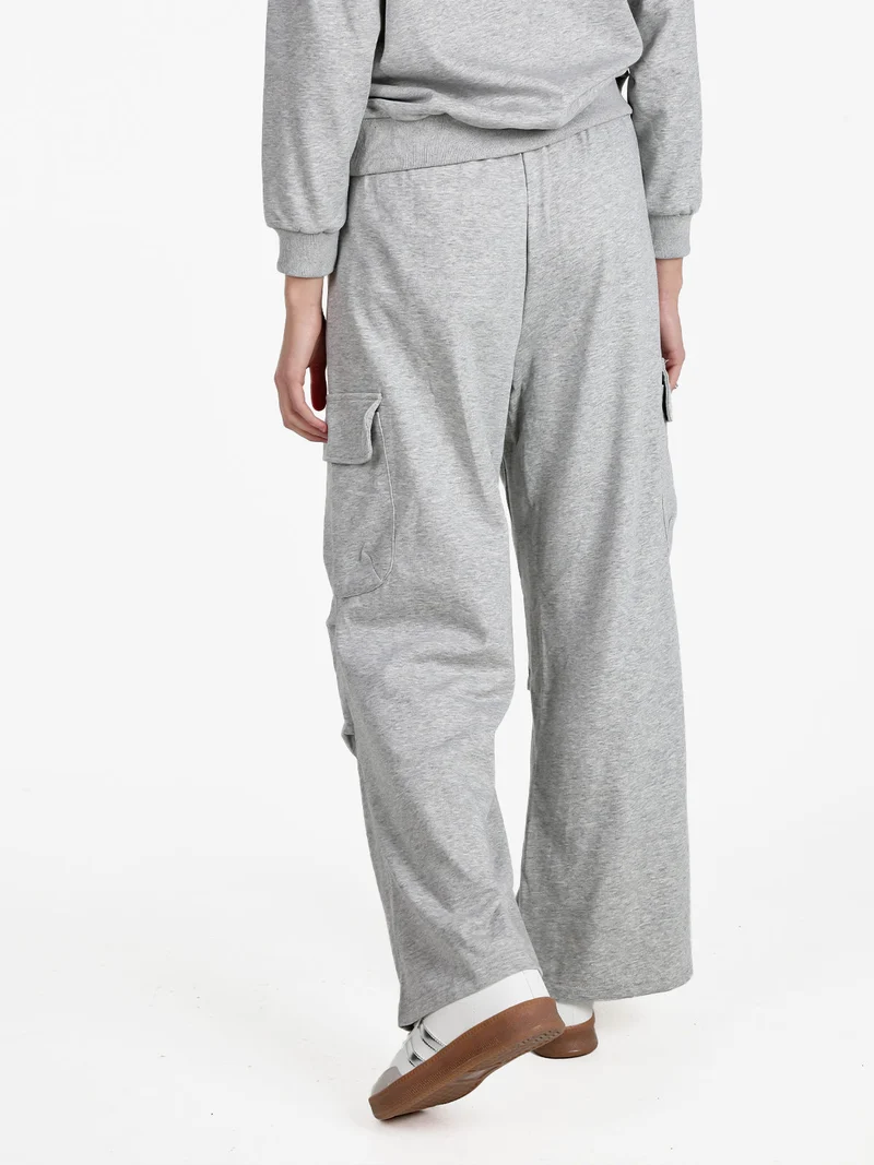 Pantaloni donna in felpa con tasconi - grigio