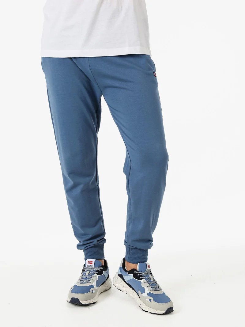 Pantaloni tuta da uomo in cotone con coulisse e polsini - blu