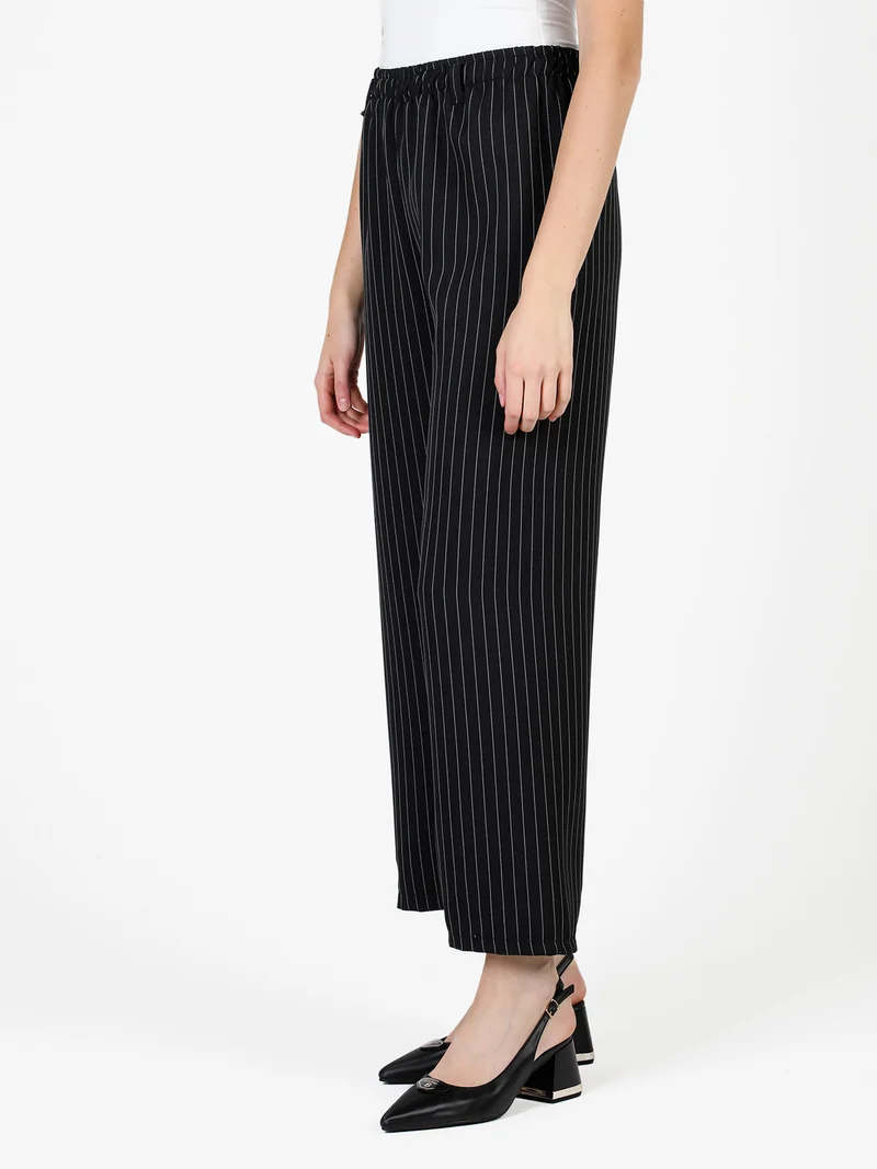 Pantaloni donna gessati a gamba larga - nero