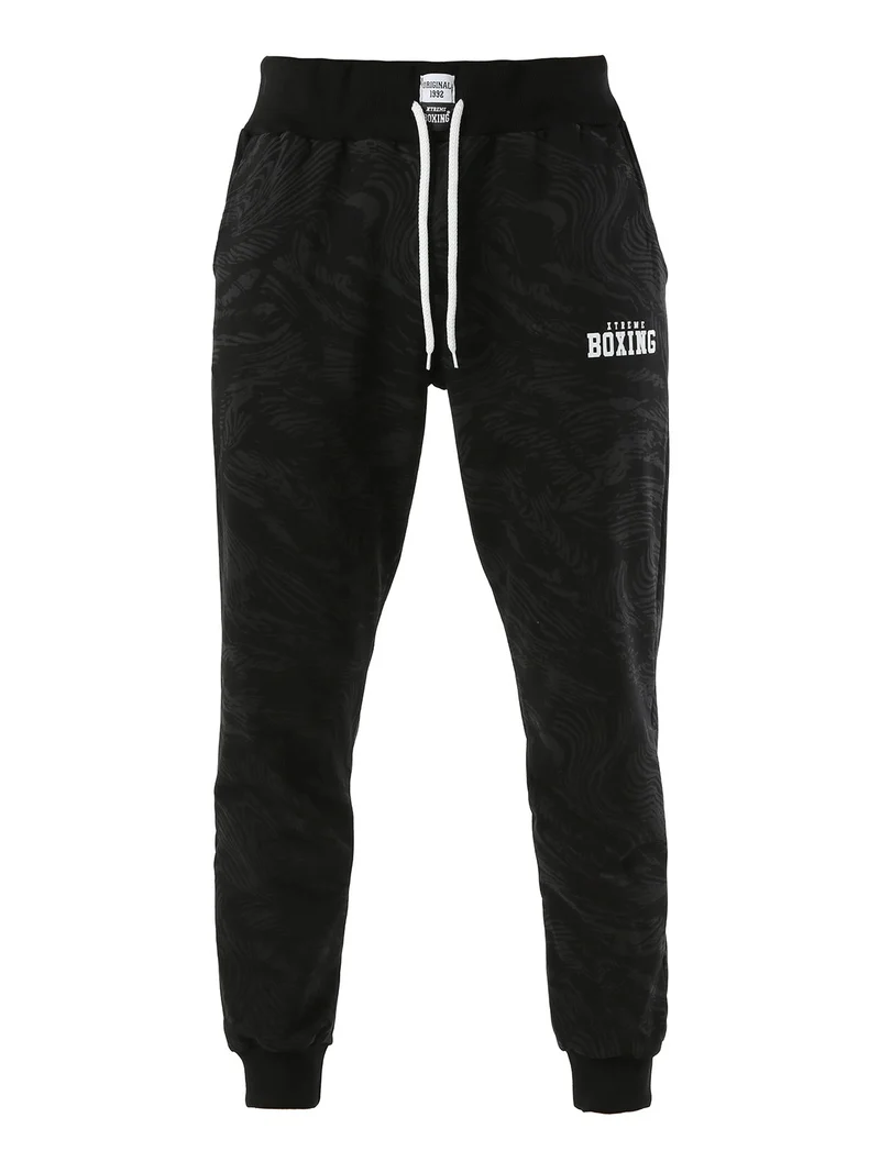 Pantaloni tuta da uomo in cotone con stampe e polsini - nero