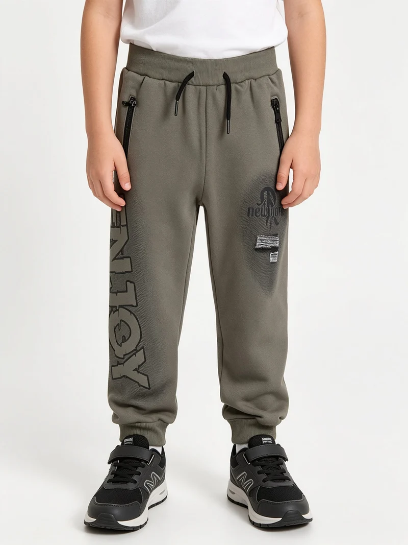 Pantaloni tuta da bambino con polsini e interno caldo - militare