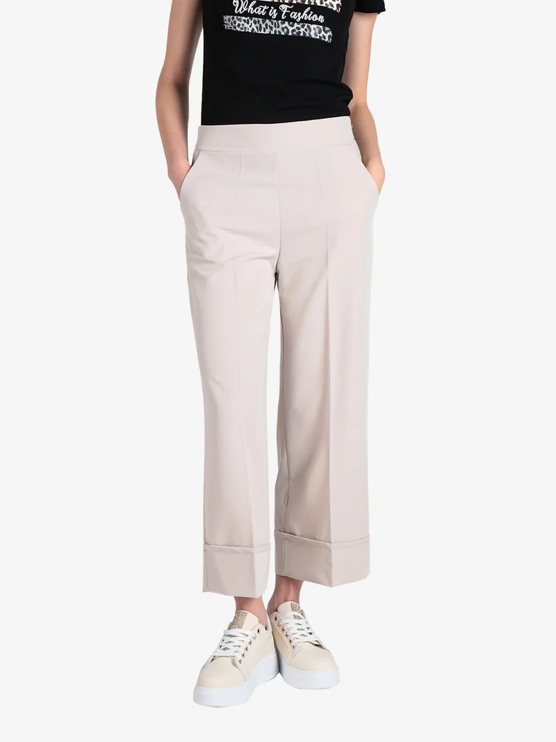 Pantaloni donna crop con risvolto alto - beige