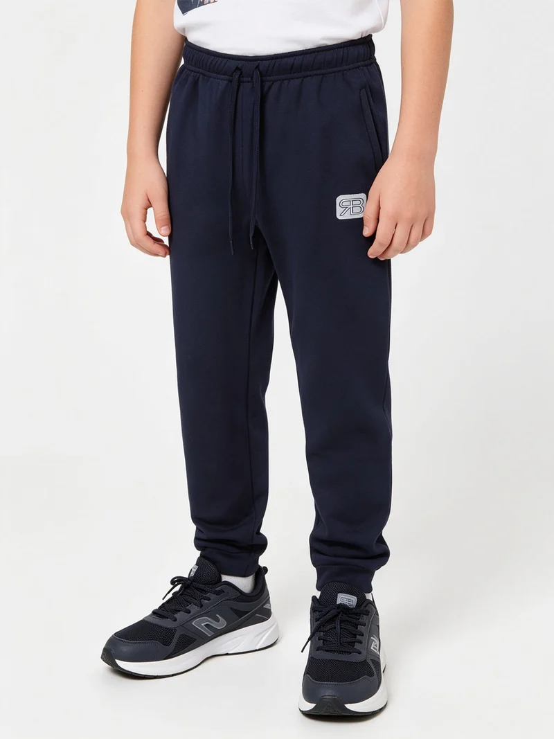 Pantaloni sportivi da bambino felpati - blu scuro