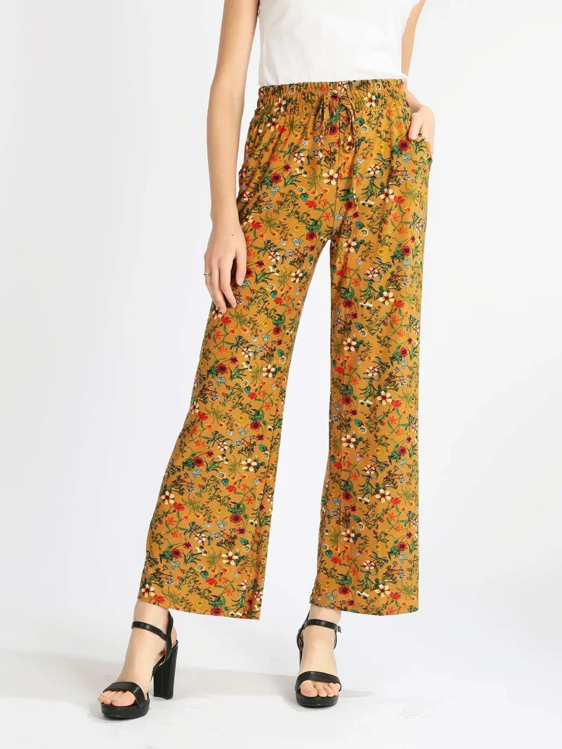 Pantaloni donna a palazzo floreali - cammello