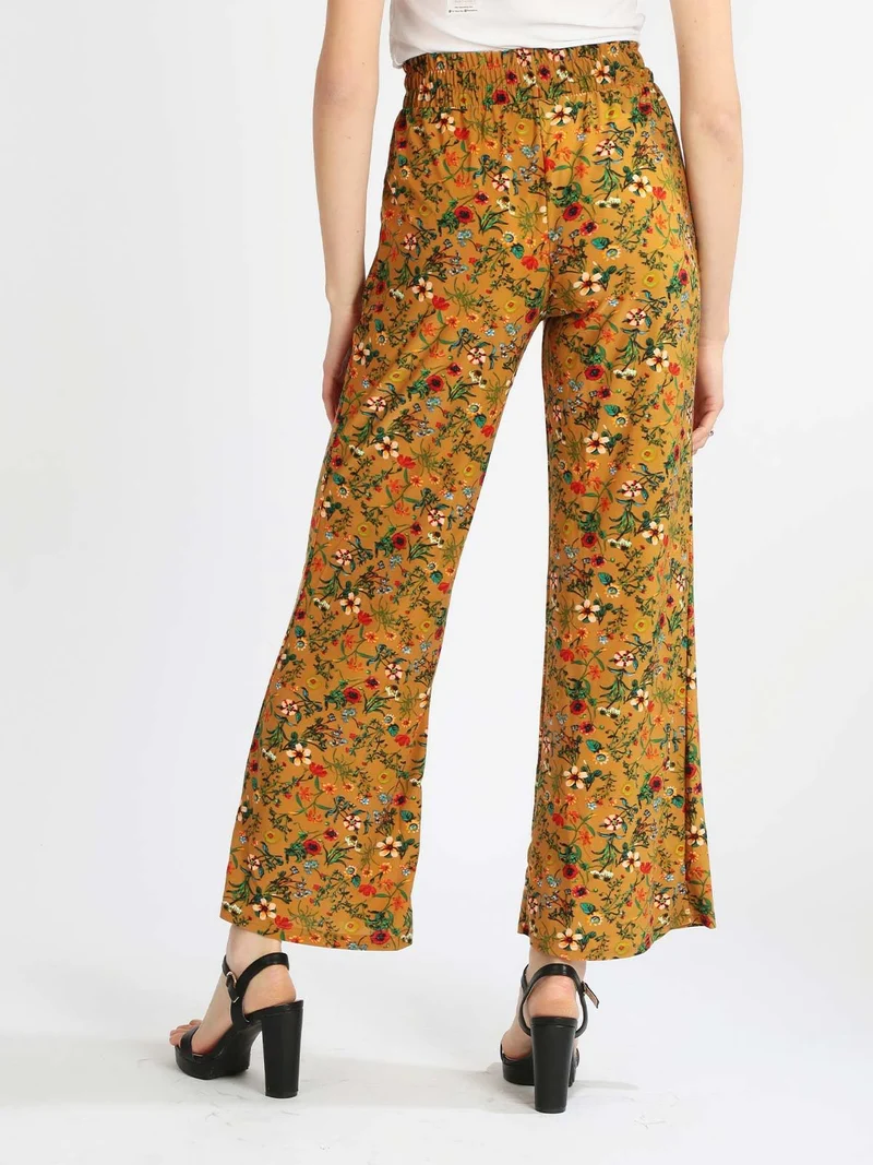 Pantaloni donna a palazzo floreali - cammello
