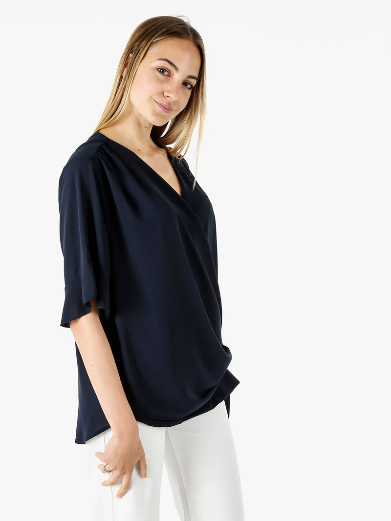 Blusa donna elegante a maniche corte annodata sul fondo - blu scuro