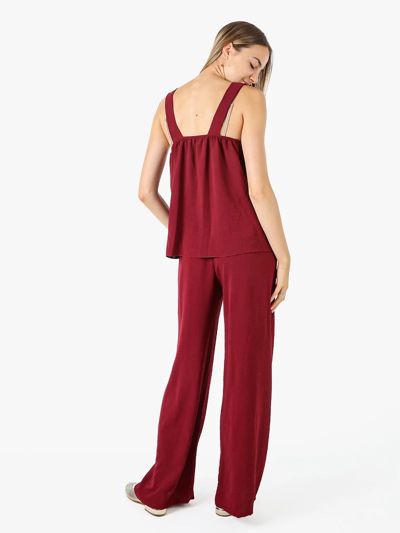 Completo casual da donna con top e pantaloni a gamba larga - bordeaux