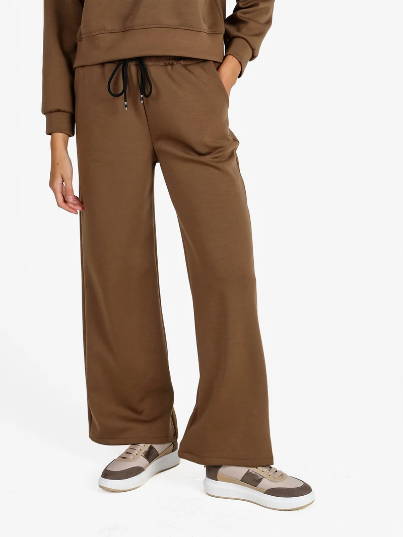 Pantaloni donna in felpa a gamba larga con coulisse - marrone