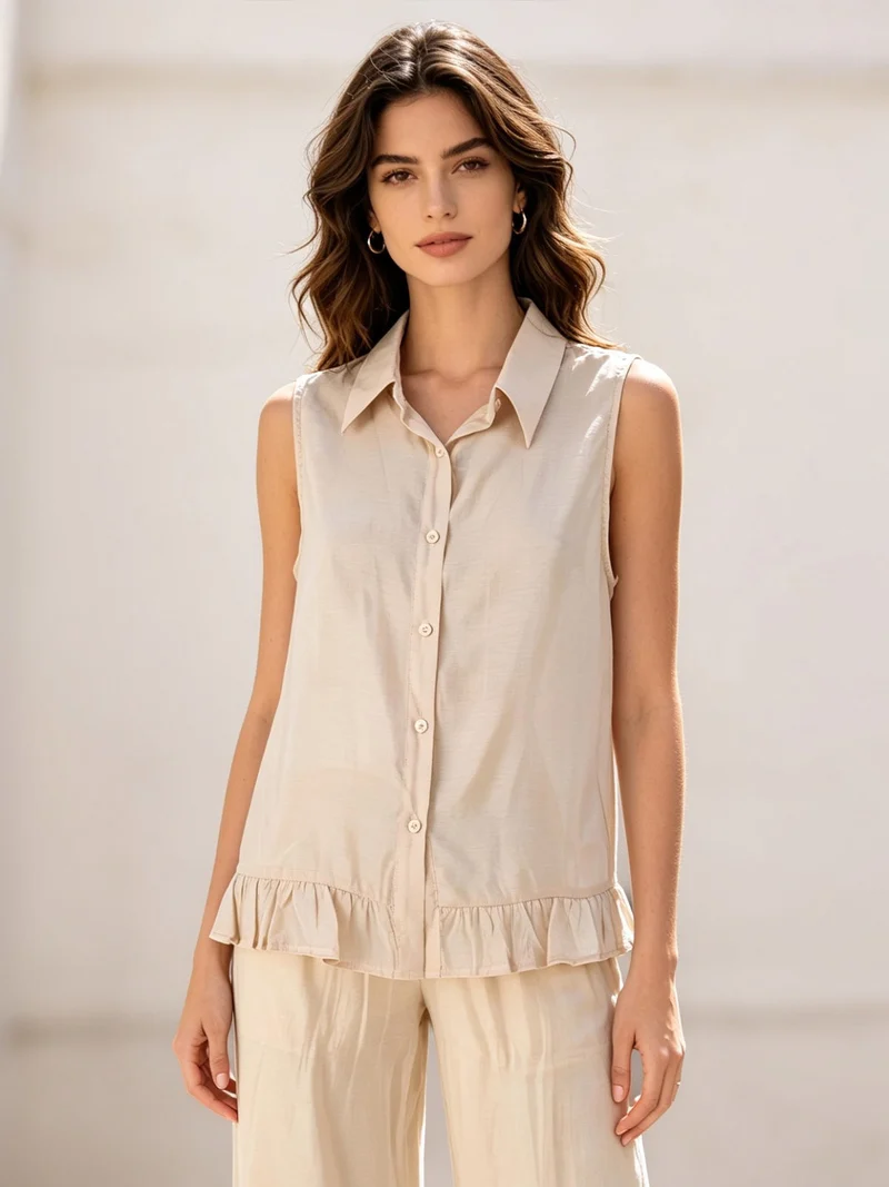 Camicetta smanicata da donna con volant sul finale - beige