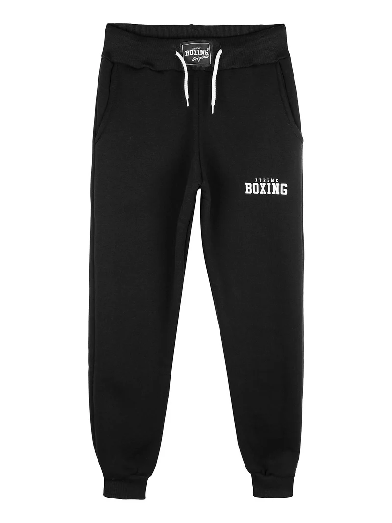 Pantaloni sportivi da ragazzo con coulisse e polsini - nero