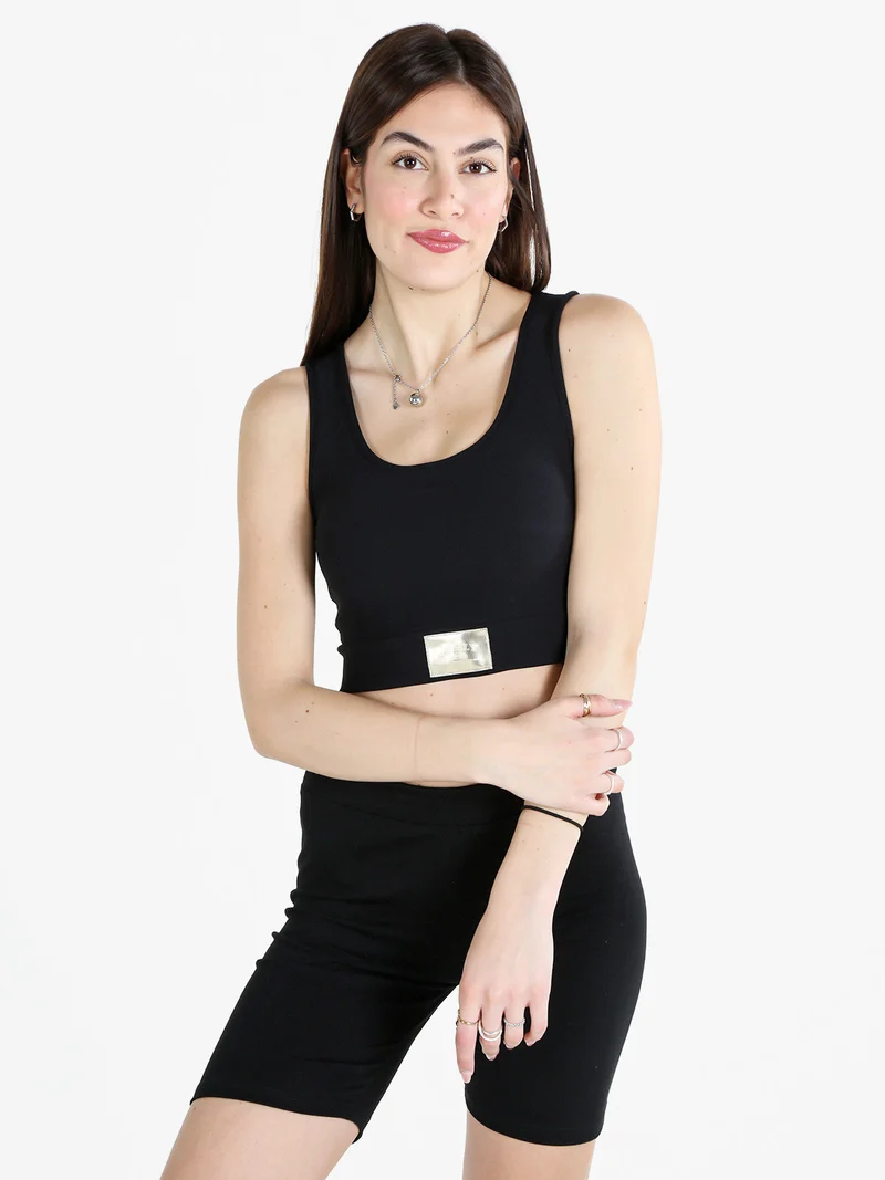 Top donna sportivo a costine con coppe imbottite - nero