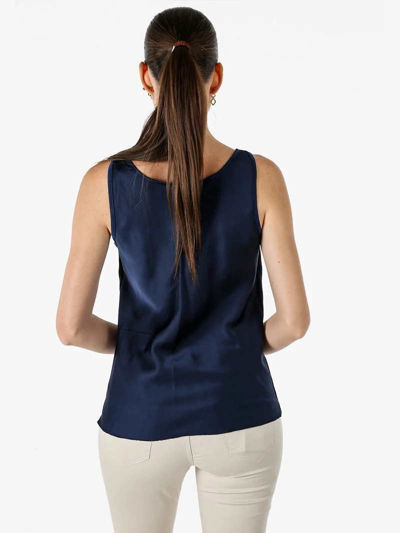 Top donna smanicato con scollo a cascata in tessuto effetto raso - blu scuro