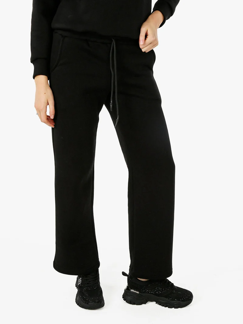 Pantaloni da donna in felpa a gamba larga con coulisse - nero