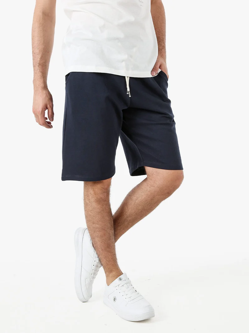 Bermuda da uomo in felpa con coulisse - blu scuro