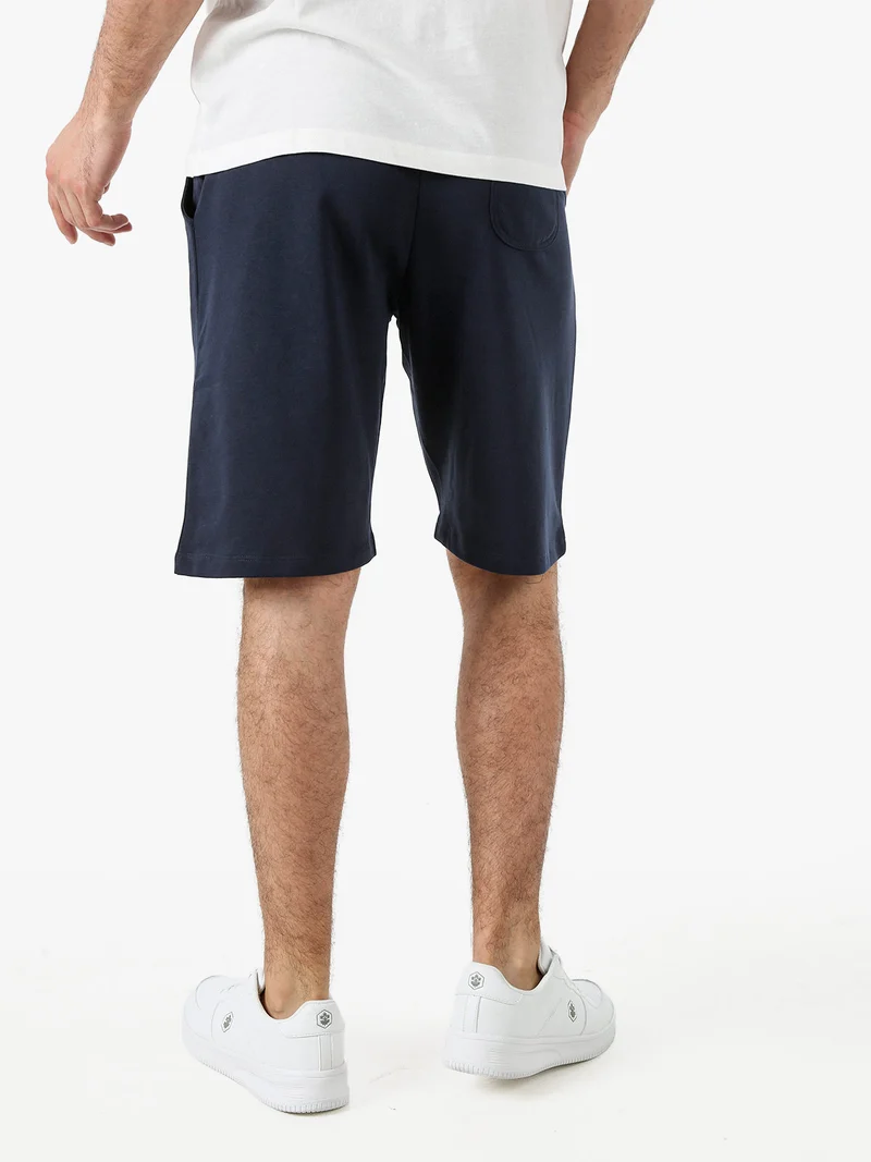 Bermuda da uomo in felpa con coulisse - blu scuro