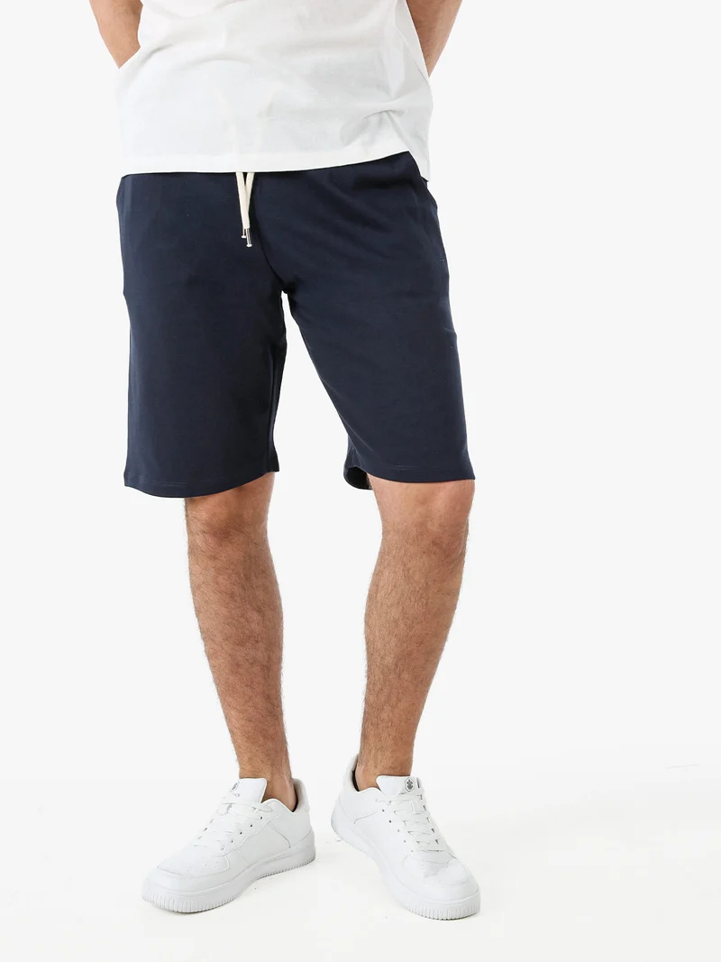 Bermuda da uomo in felpa con coulisse - blu scuro