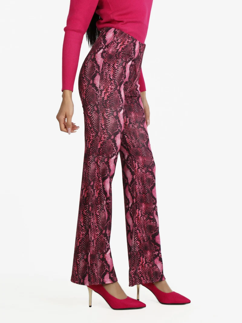Pantaloni donna pitonati a zampa - fucsia