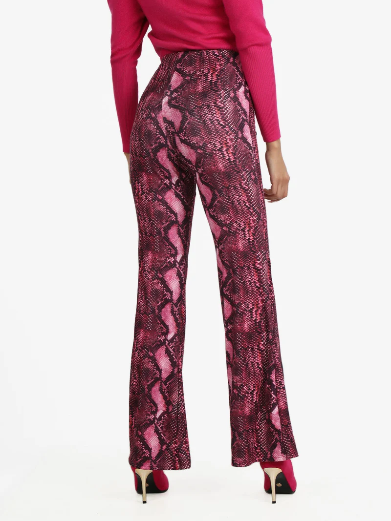 Pantaloni donna pitonati a zampa - fucsia