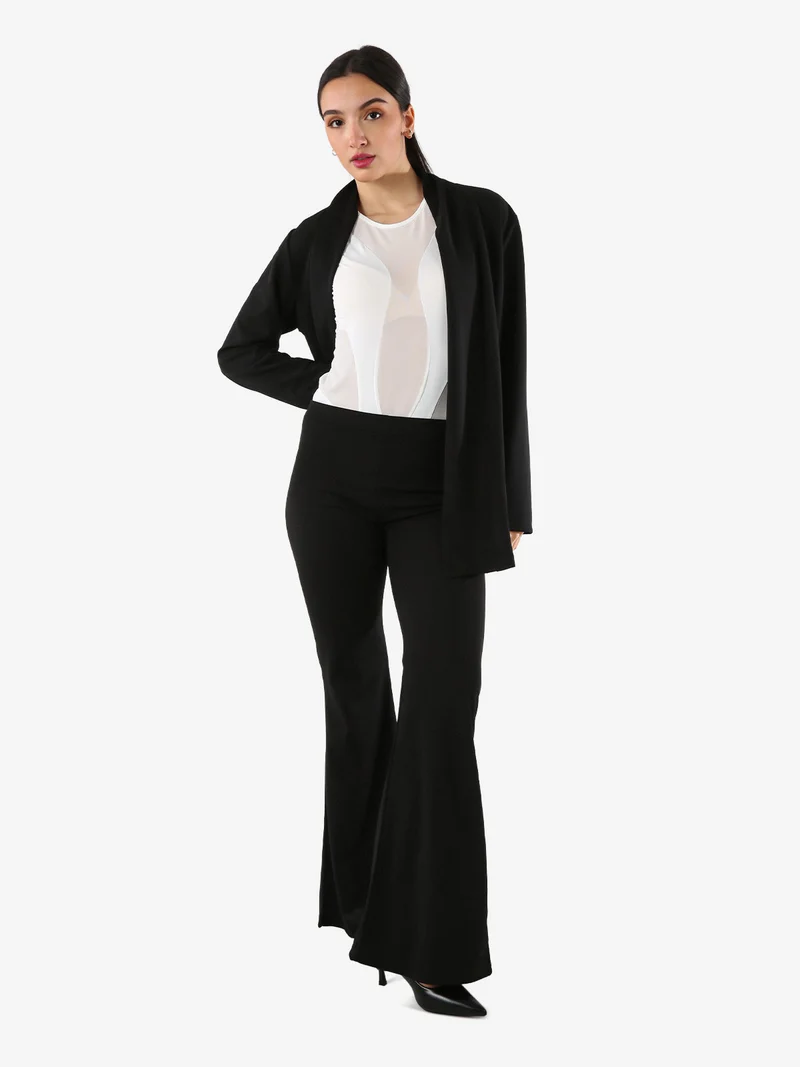 Pantaloni eleganti da donna con finale a zampa - nero
