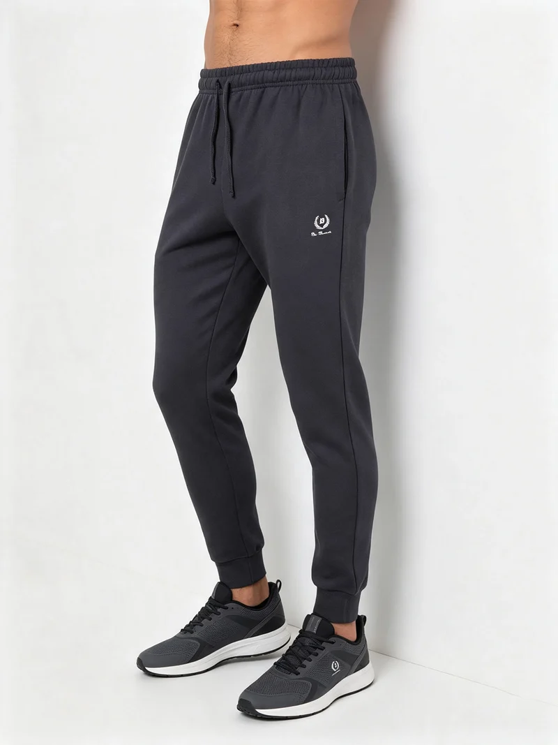 Pantaloni sportivi da uomo in felpa con polsini - blu scuro