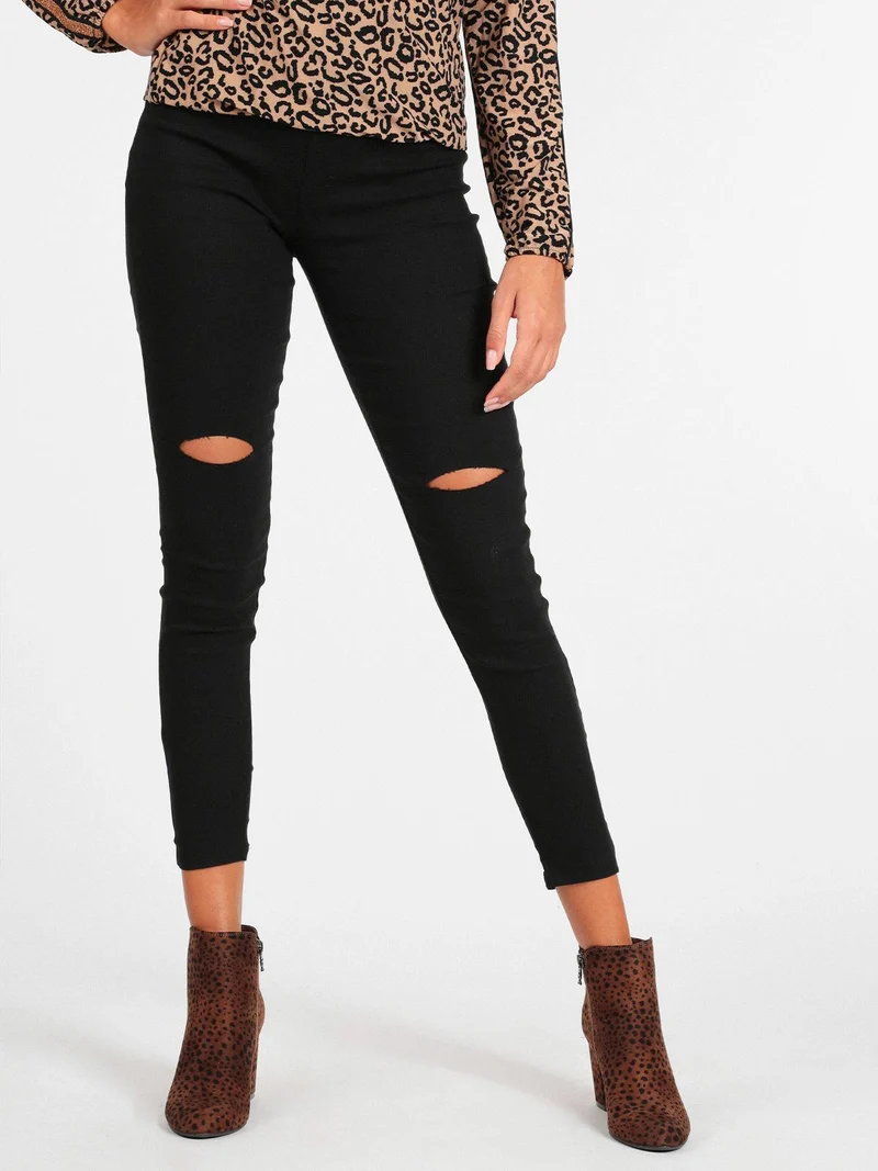 Leggings donna con strappi - nero