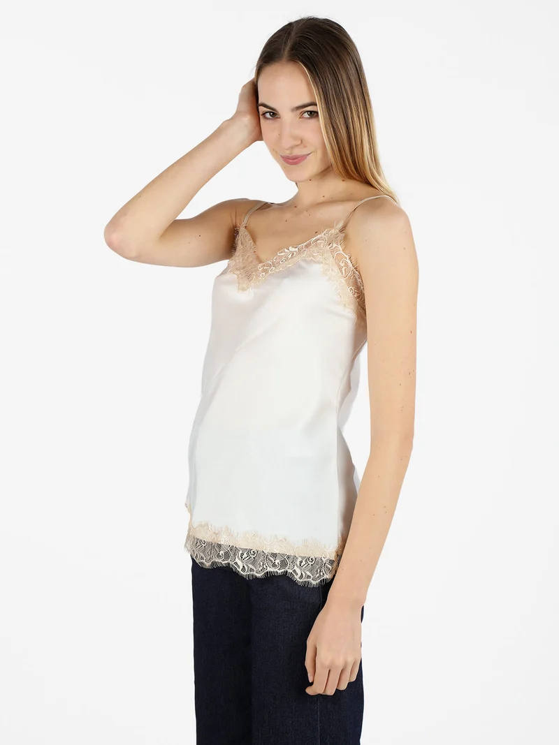 Top donna effetto raso con pizzo - bianco